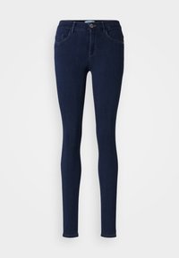 Vaqueros skinny de un azul oscuro, confeccionados en denim, con un diseño estándar de cinco bolsillos, pasadores para cinturón y cierre de botón metálico.