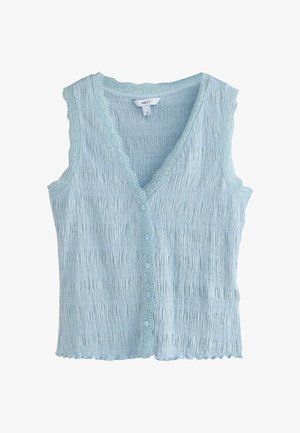 Lyseblå strikket ærmeløs top med knapper foran, bølget kant og blonder langs udskæringen og ærmegabene.