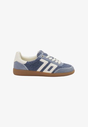Low-top sneaker in blue textile and suede, featuring white stripes and a textured finish. Rubber sole provides grip and durability.