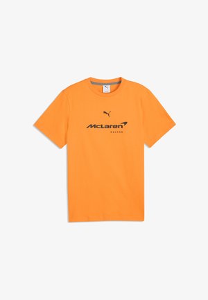 Maglietta arancione a maniche corte con logo Puma nero sopra la scritta nera McLaren Racing sul davanti.
