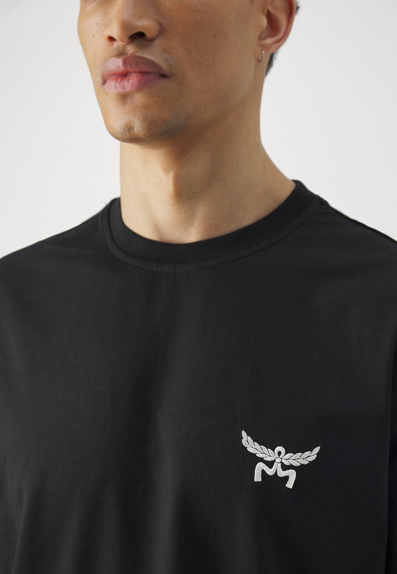 MCM T-Shirt print - black/schwarz - Zalando.de