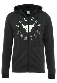 Sudadera con cremallera en gris oscuro, hecha de una tela suave. Presenta una capucha negra, bolsillos tipo canguro y una impresión gráfica blanca que dice "TODO EL DÍA EN ACCIÓN".
