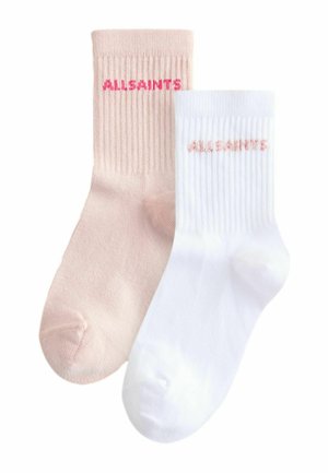 Two ribbed crew socks, one light pink and one white, each with "ALLSAINTS" branding in pink near the top cuff.