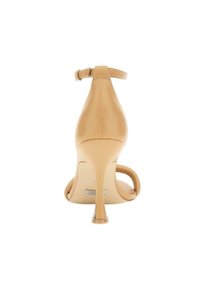 Sandal con tacco alto nudo e cinturino alla caviglia, tomaia in pelle liscia, punta aperta e sottile tacco a stiletto. Presenta un contrafforte posteriore e decorazioni minime.