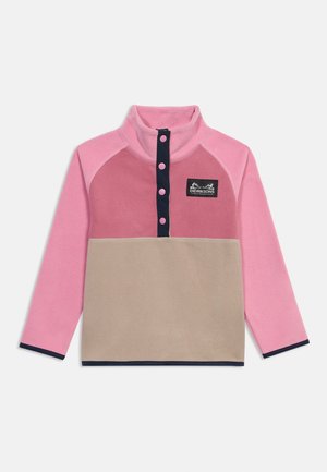 Laste fliisist pullover roosade varrukate, beeži kehaosa, trukkidega eesmine osa ja Didriksonsi logoga märk rinnal.
