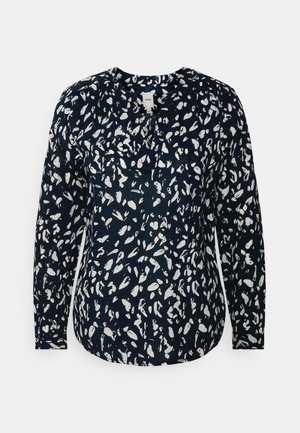 Marineblauwe blouse met lange mouwen en een wit abstract bladerenpatroon, ronde halslijn en een licht gebogen zoom. Gemaakt van zachte stof, met een ontspannen pasvorm.