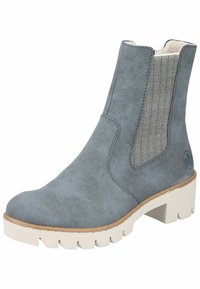 Grå mocka ankelsboot med elastisk sidopanel som har ett hundtandsmönster, vit klumpig sula och rund tådesign.