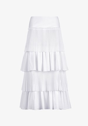 White tiered skirt with alternating pleated and smooth fabric layers and a wide waistband.
