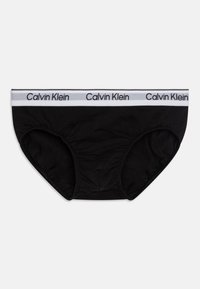 Čierne bavlnené nohavičky s bielym elastickým pásom s logom "Calvin Klein". Strih prispôsobený postave s jemnou textúrou a bez viditeľných vzorov.