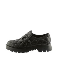 Black quilted leather shoe with a rounded toe, featuring a wide strap and buckle detail. Thick rubber sole with traction grooves.