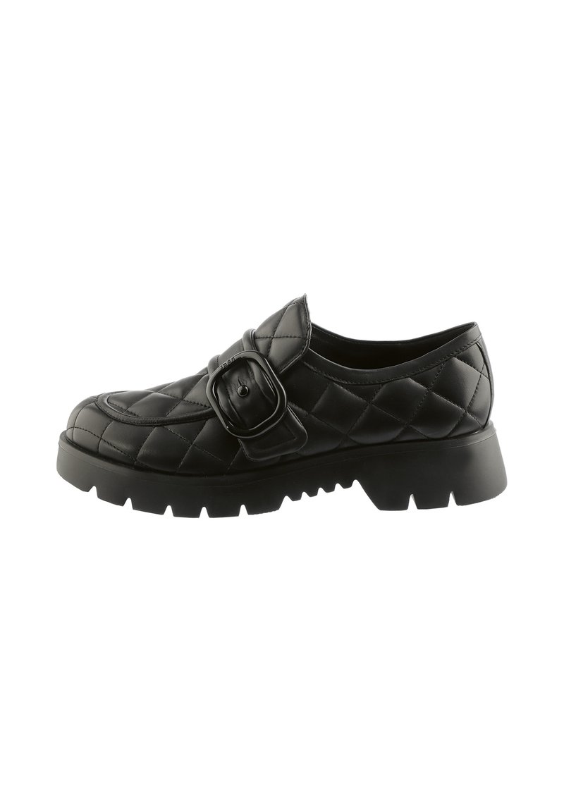 Black quilted leather shoe with a rounded toe, featuring a wide strap and buckle detail. Thick rubber sole with traction grooves.