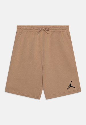 Beige shorts med snøre i taljen, elastisk taljebånd, sidelommer og lille sort Jumpman-logo på venstre ben nederst.