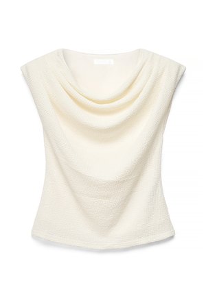 Hõlmikuga kaelusega varrukateta kreemjas tekstuuriga top, millel on veidi vormitud lõige.