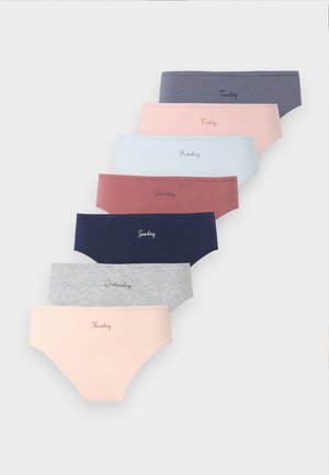 Sedm dámských spodních prádelen v různých barvách uspořádaných vertikálně, každý označen jiným dnem v týdnu od pondělí do neděle.