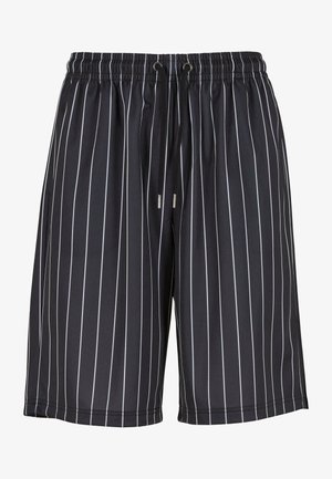 Mustad mustriga tumedad šortsid, millel on valged vertikaalsed triibud. Omab elastset vööd, millel on pael ja küljetaskud. Kerge materjal.