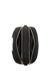 Schwarze Lederhandtasche mit drei goldenen Reißverschluss-Schließungen, runder Form, strukturiertem Oberflächenmaterial und akzentuiertem Metallbeschlag. Innenleben sichtbar durch die geöffneten Sektionen.