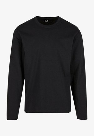 Tricou negru cu mânecă lungă din bumbac moale. Are un guler rotund, croială dreaptă și fără modele. Design simplu potrivit pentru a fi purtat în straturi.