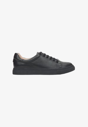 Black leather sneakers with a rounded toe, flat rubber sole, and six eyelets for laces. Smooth texture with minimal decorative elements.