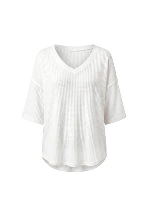 Weißes kurzärmeliges Stricktop mit V-Ausschnitt, lockerer Passform und strukturiertem Waffelmuster, hinten leicht länger.