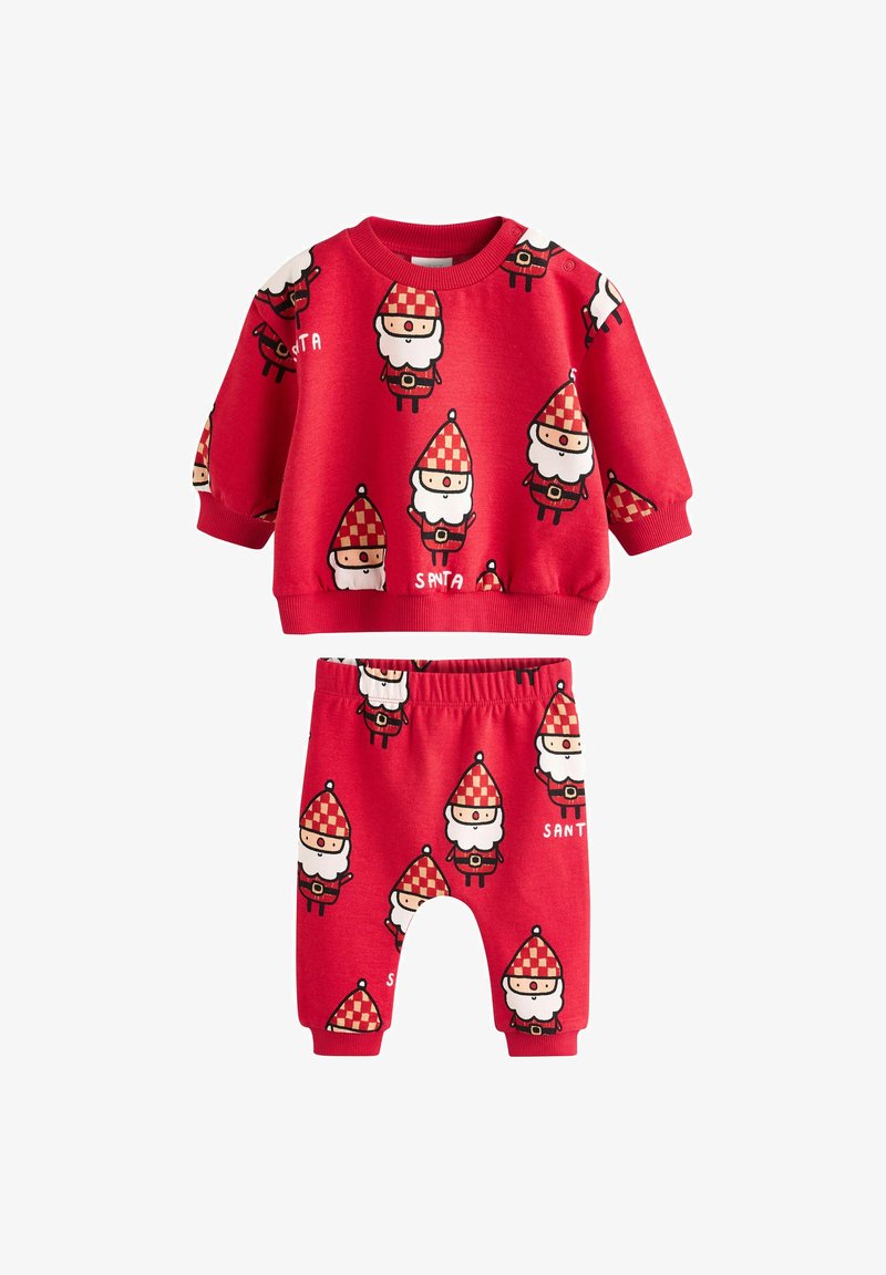 Red cotton two-piece outfit featuring a patterned sweatshirt and matching pants, decorated with cartoon Santa Claus designs.