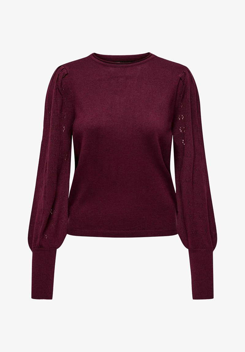 Pull en tricot bordeaux avec de longues manches bouffantes. Dispose d'un motif de dentelle texturé sur les manches et des bords-côtes aux poignets et à l'ourlet. Encolure ronde.
