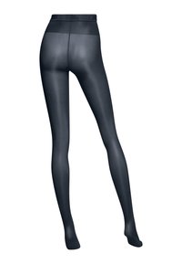 Collant opachi blu navy realizzati in nylon, dotati di vita a fascia e texture liscia, progettati per adattarsi comodamente alle gambe.