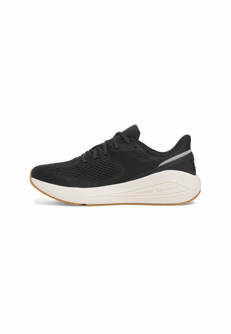Black running shoe with a breathable mesh upper, textured surface, white midsole, and gum rubber outsole. Features laces and a logo.