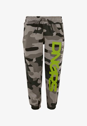 Joggers camouflés dans des nuances de gris et de vert, avec une taille élastique dotée d'un cordon de serrage et un texte audacieux "DANGEROUS" en vert sur le côté.