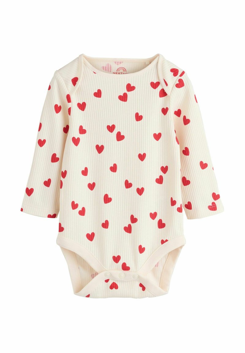 Kreemikas beebibodi soonilise tekstuuriga, millel on hajutatud punased südamekujundid ja allosas presskinnitused. Pikad varrukad.