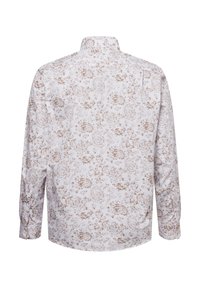 Langarmhemd mit weißem Grund und aufwendigem braunem Blumenmuster. Klassischer Kragen und Knopfmanschetten, aus leichtem Stoff gefertigt.