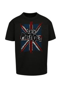 Black cotton t-shirt featuring a distressed Union Jack design in red, blue, and white, with the text "Sex Pistols" prominently displayed.