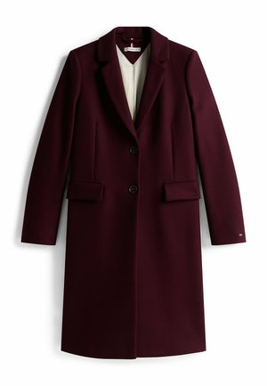 Bordeauxrode wollen mantel met een notched kraag, twee voorzakken, enkele knoopsluiting en lange mouwen. Voering aan de binnenkant.