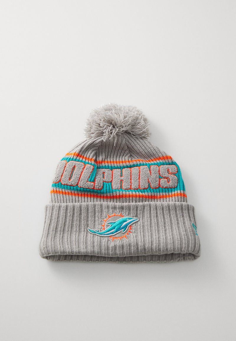 Gray knitted beanie with a ribbed texture, featuring "Dolphins" in bold turquoise and orange stripes, topped with a fluffy pom-pom and logo patch.