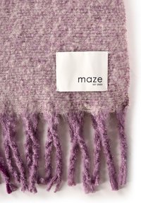 Purple textured scarf with loose, frayed ends. Features a white label with "maze EST 2003" printed in black. Soft woolen material.