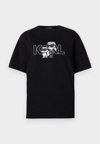 Black cotton t-shirt featuring a graphic print of two cartoon figures with sunglasses, accompanied by the text "KARL" in bold letters.