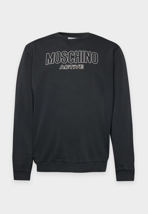 Sweat-shirt noir à manches longues, avec des poignets et un bas côtelés, et l’inscription blanche « MOSCHINO ACTIVE » en contour sur la poitrine.