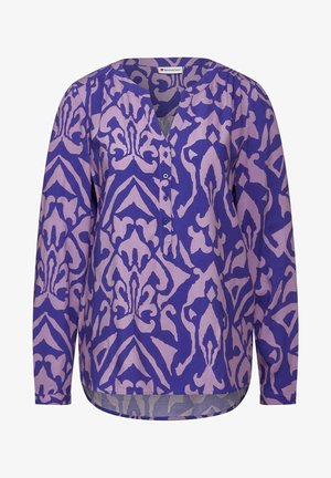 Lila und helllila gemusterte Bluse mit V-Ausschnitt, langen Ärmeln, Knopfleiste und abgerundetem unteren Saum. Der Stoff wirkt leicht.