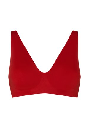 Rød sømløs trådløs bh med dyb V-udskæring og brede skulderstropper, designet til komfort og støtte uden bøjle.