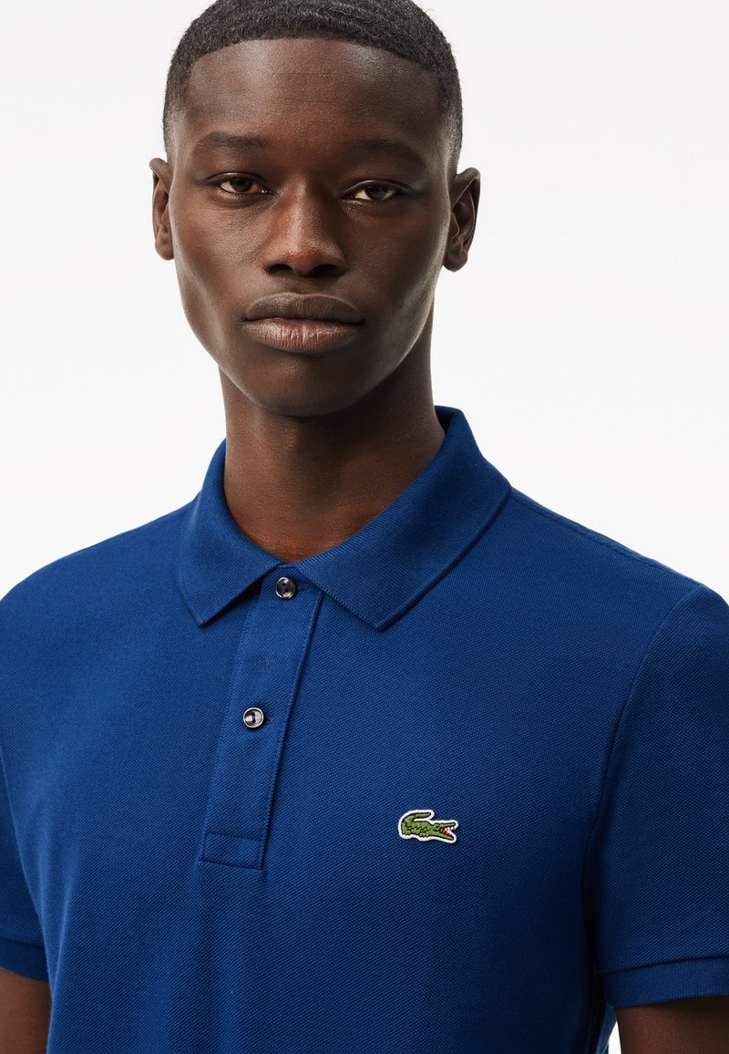 Lacoste Polo bleu hbm/azul