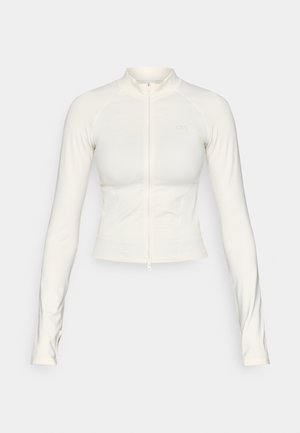 White long-sleeve zip-up jacket with a fitted design, made of stretchy fabric, featuring a stand collar and a small logo on the chest.