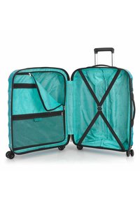 Maleta rígida en color teal con un interior estampado. Sus características incluyen compartimentos dobles, bolsillo de malla con cremallera y correas ajustables para la organización.