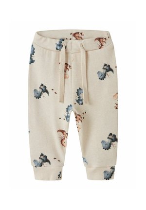 Beige baby pants with blue and brown dinosaur prints, elastic waistband with cream drawstrings, and cuffed ankles.