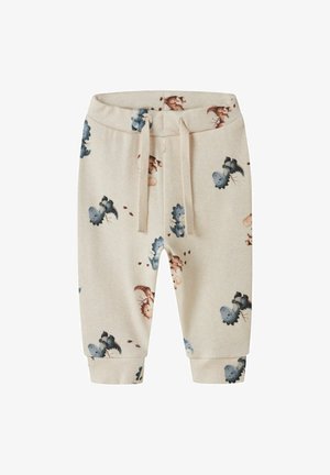 Beige baby pants with blue and brown dinosaur prints, elastic waistband with cream drawstrings, and cuffed ankles.