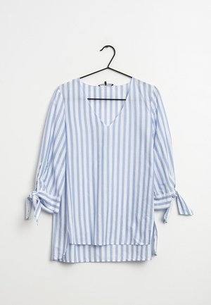 Light blue and white striped blouse with a V-neck, three-quarter sleeves, and tie accents on the sleeves. Made of a soft fabric.