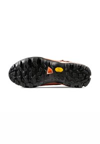 Bruine sport schoen zool met een gestructureerde zwarte rubberen buitenzool, voorzien van diepe profielen en een Vibram-logo in het geel op een driehoekige achtergrond.