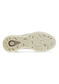 Light-colored sneaker outsole with a textured pattern, featuring wavy grooves and a round logo detail in the center.
