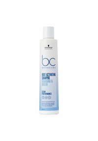 Witte plastic shampoofles met een flip-top, voorzien van een blauw verloopontwerp, met het label "BC Bonacure Root Activating Shampoo" in blauwe tekst.