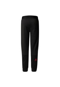 Svarte treningsbukser med en strukturert nedre del og rødt logoakent. Har elastisk midjebånd og tilspissede ben for en tettsittende fasong.