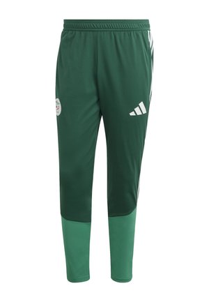 Zelene športne hlače z belimi Adidas črtami in logotipom. Iz lahkega materiala, z elastičnim pasom in zoženimi hlačnicami.