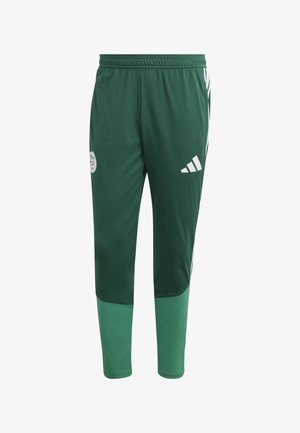 Zelené športové nohavice s bielymi pruhmi a logom Adidas. Vyrobené z ľahkého materiálu, s elastickým pásom a zužujúcimi sa nohavicami.